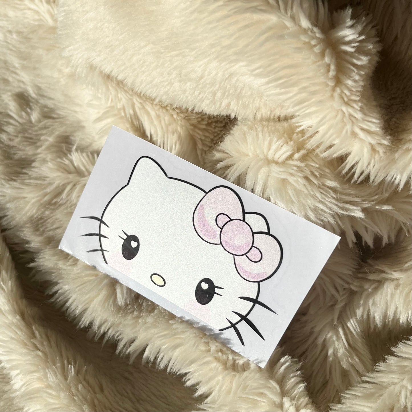 Baby Hello Kitty Peeker