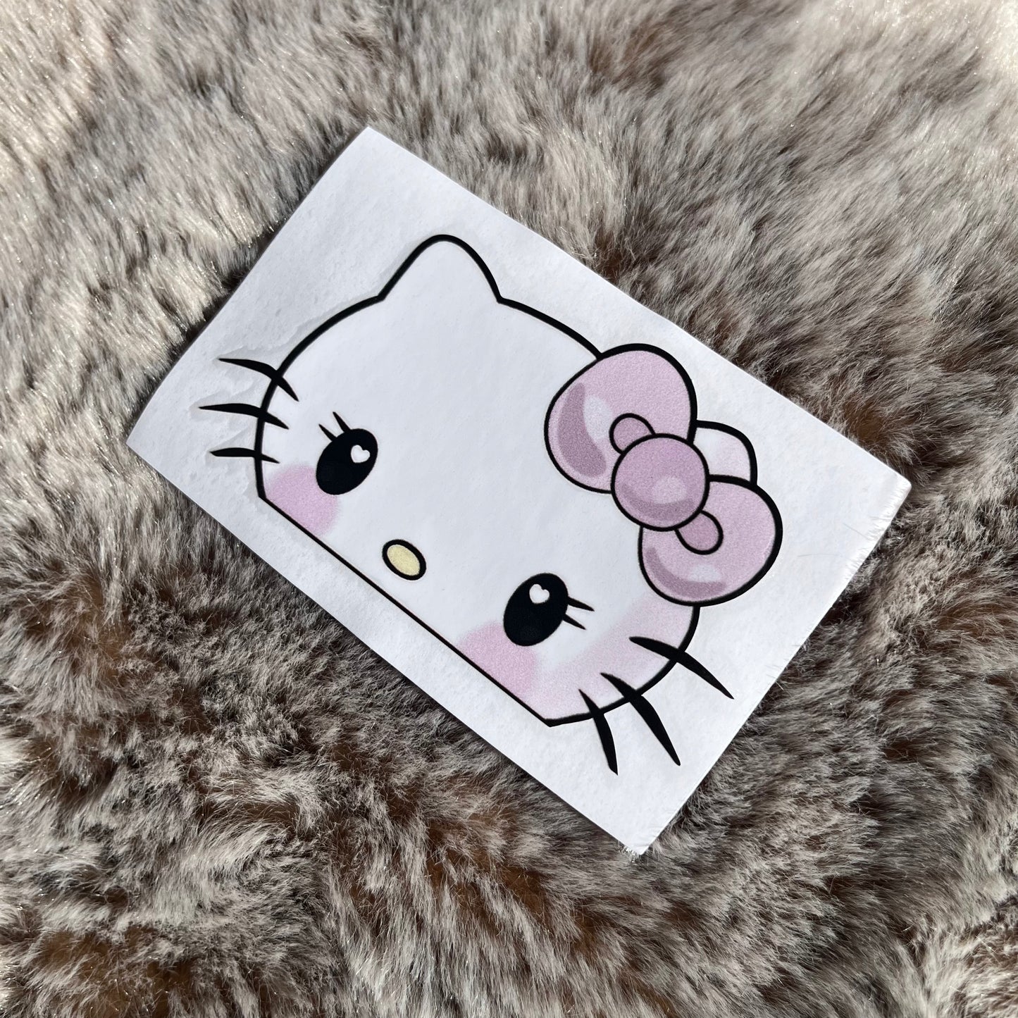 Baby Hello Kitty Peeker