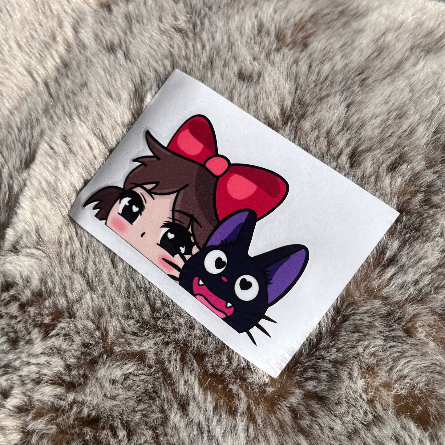 Kiki x Jiji Peeker